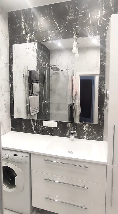 Зеркало в ванной прямоугольное